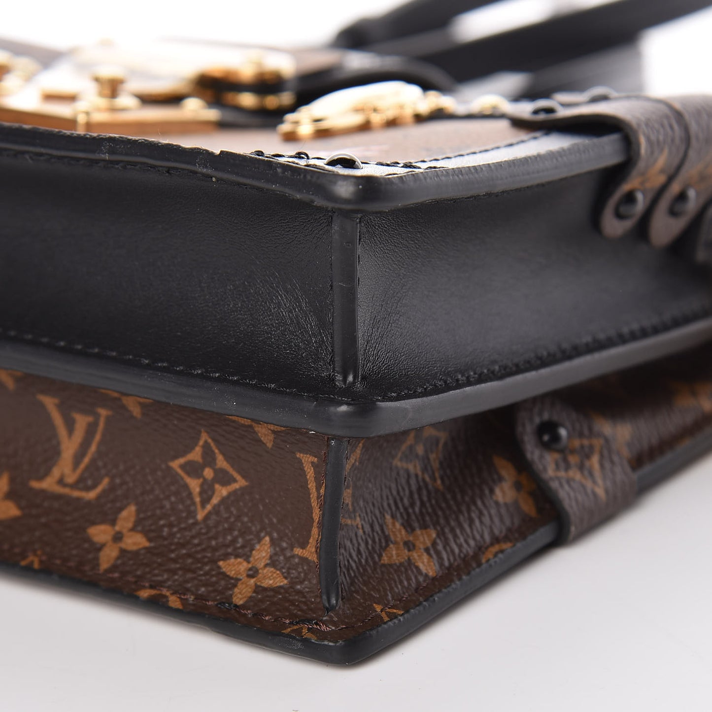 Reverse Monogram Trunk Clutch