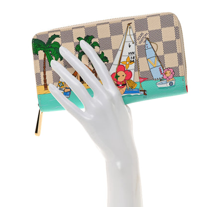 Louis Vuitton Damier Azur 2023 Christmas Animation Sailing Vivienne Zippy Wallet Dragon Fruit Pink 2 of 7
