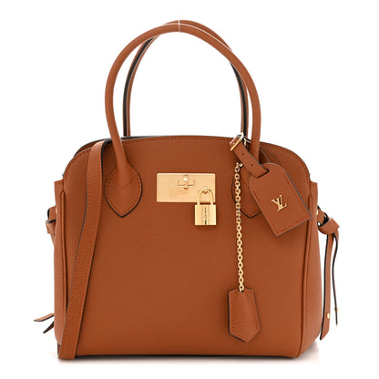 Louis Vuitton Veau Nuage Milla PM Gold 1 of 9