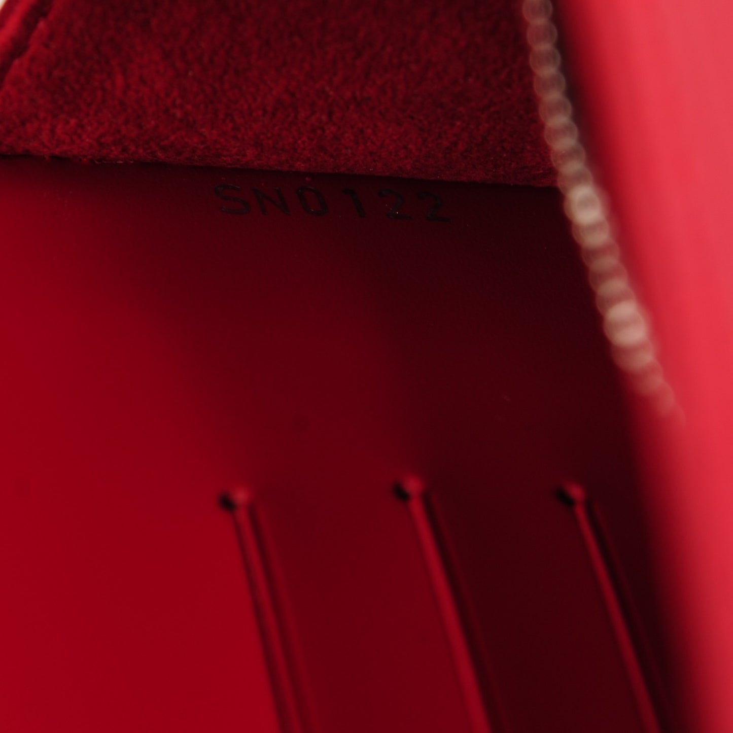 Epi Sevigne Clutch Carmine