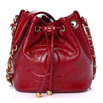 Chanel Shiny Aged Calfskin CC Chain Mini Drawstring Bag Red 1 of 14