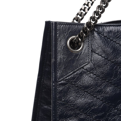 Saint Laurent Crinkled Calfskin Matelasse Monogram Niki Shoulder Bag Deep Marine 12 of 12