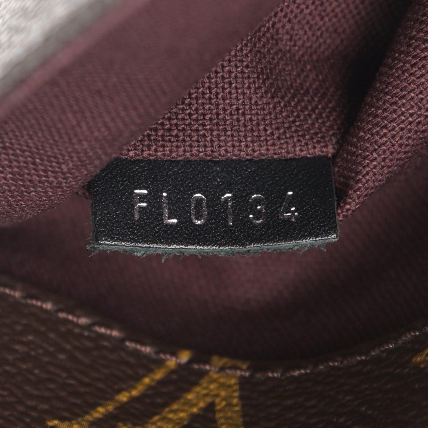 Monogram Macassar District PM