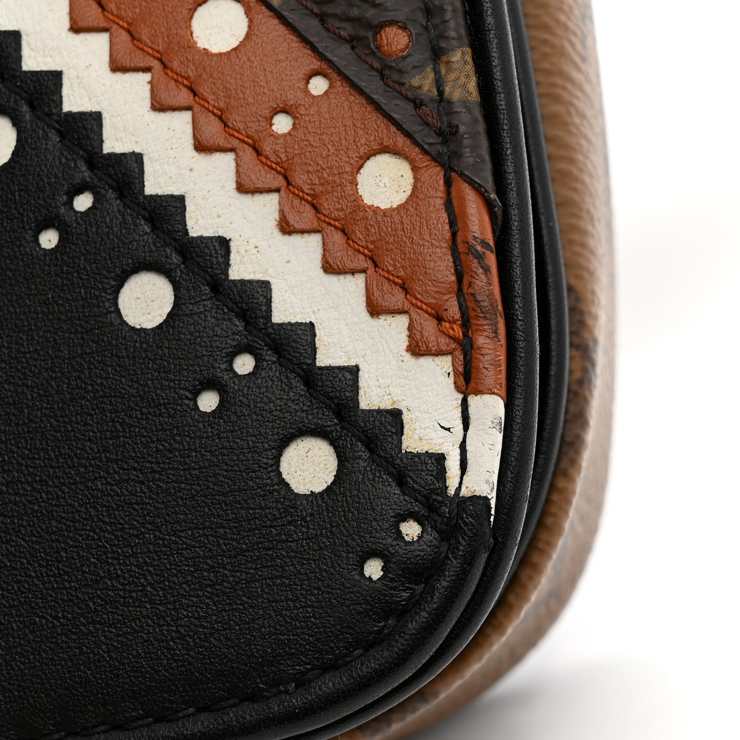 Monogram Brogue Pochette Metis