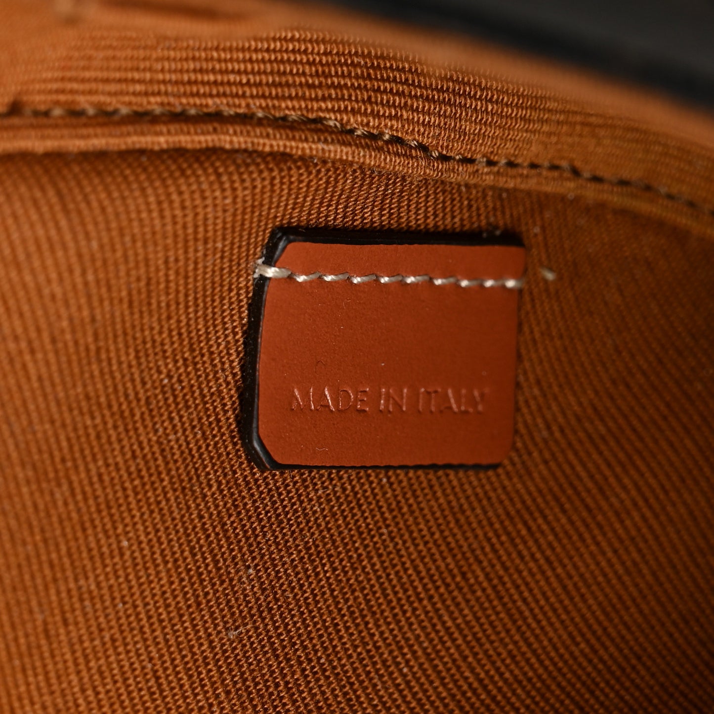 Triomphe Canvas Mini Triangle Crossbody Bag Tan