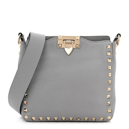Valentino Garavani Pebbled Calfskin Mini Rockstud Flip-Lock Messenger Bag Pastel Grey 1 of 9