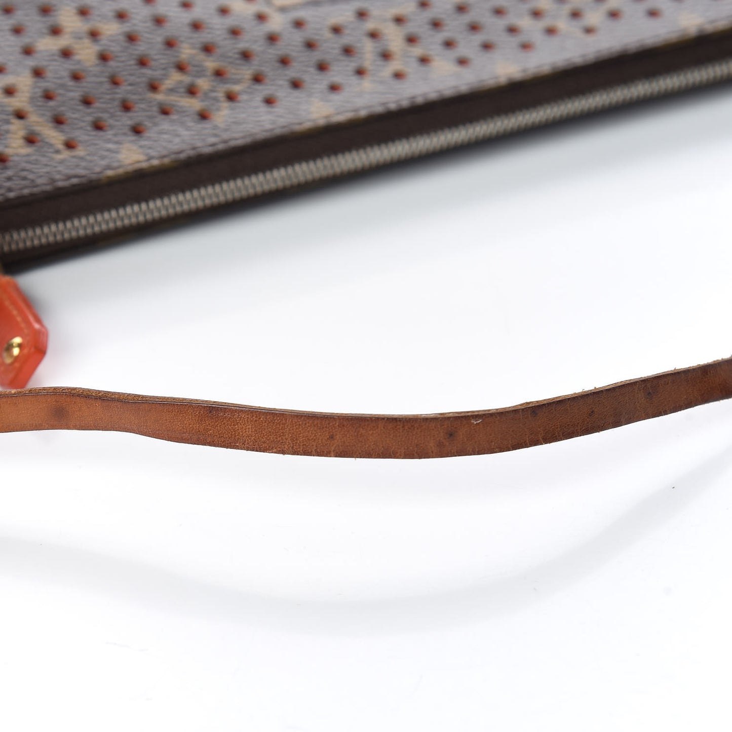 Monogram Perforated Pochette Accessories Bag Orange