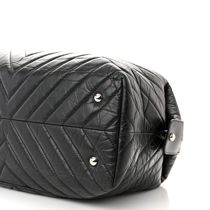 Chanel Aged Calfskin Chevron Quilted Duffle Bag Black 10 of 10