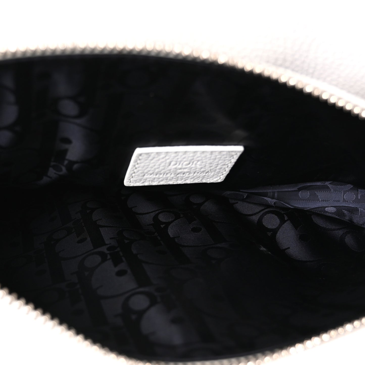 X DANIEL ARSHAM Grained Calfskin Newspaper Print Saddle Bag White