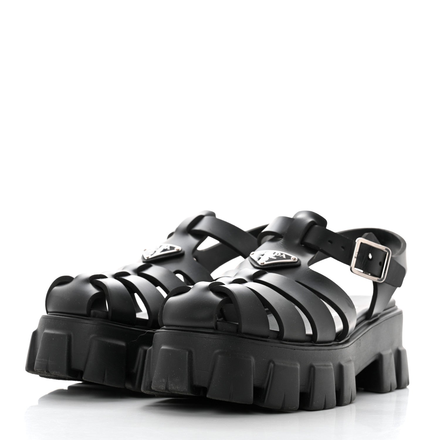 this is an image of a pair of Prada Foam Rubber Metal Triangle Logo Monolith 55mm Cage Sandals in Black by FASHIONPHILE