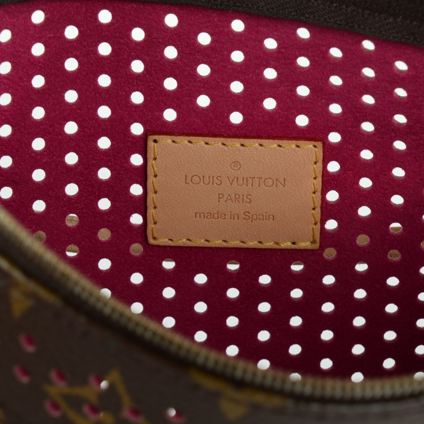 Monogram Perforated Pochette Accessories Bag Fuchsia