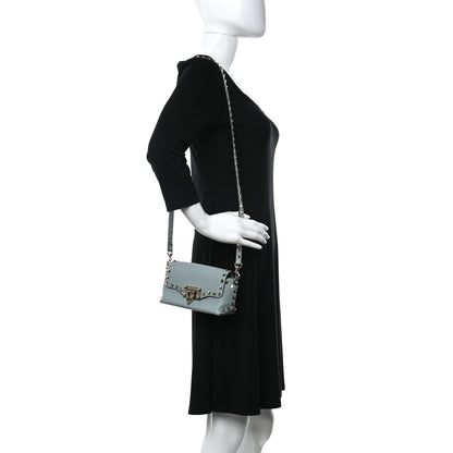 Valentino Garavani Pebbled Calfskin Rockstud Flip Lock Wallet On Chain Niagara 2 of 10