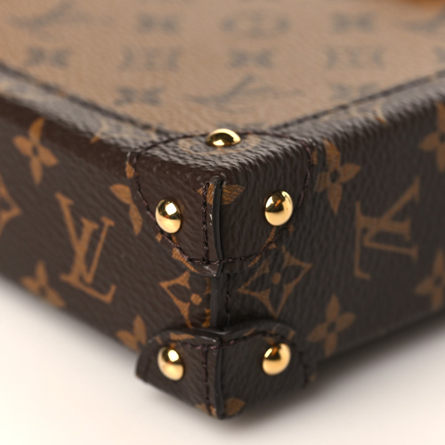 Reverse Monogram Pochette Trunk Verticale