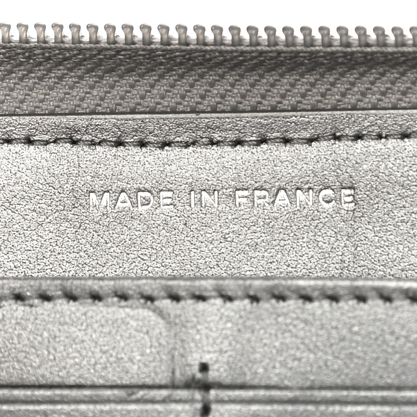 Metallic Caviar Quilted Boy Zip Around Wallet Silver