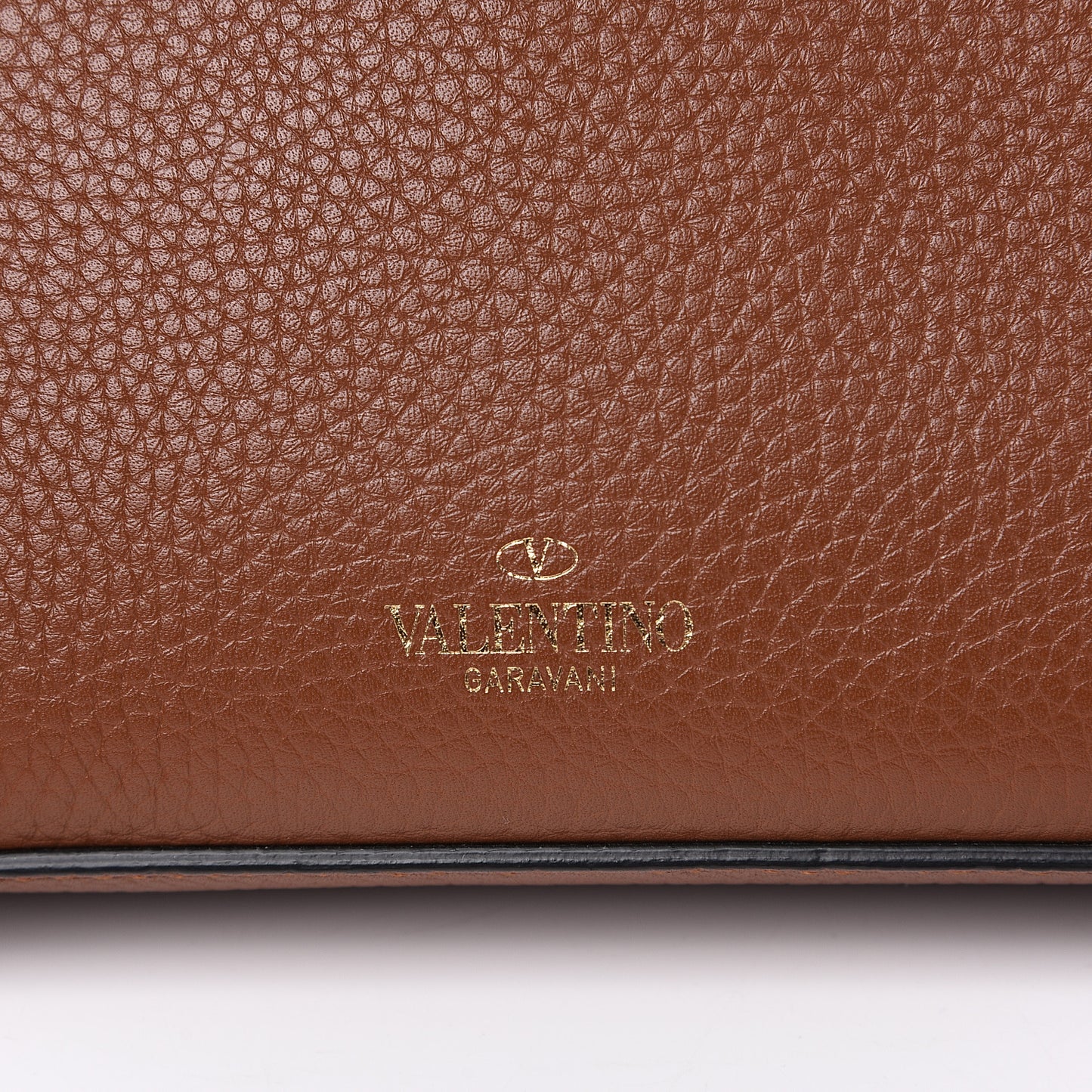 Pebbled Calfskin Medium Rockstud Flip Lock Crossbody Bag Bright Cognac