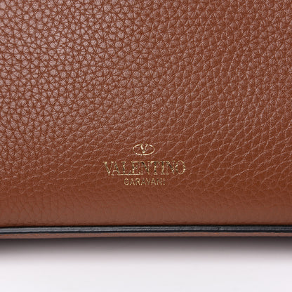 Valentino Garavani Pebbled Calfskin Medium Rockstud Flip Lock Crossbody Bag Bright Cognac 9 of 9