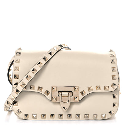 Valentino Garavani Vitello Mini Rockstud Flap Saddle Crossbody Bag Light Ivory 1 of 9