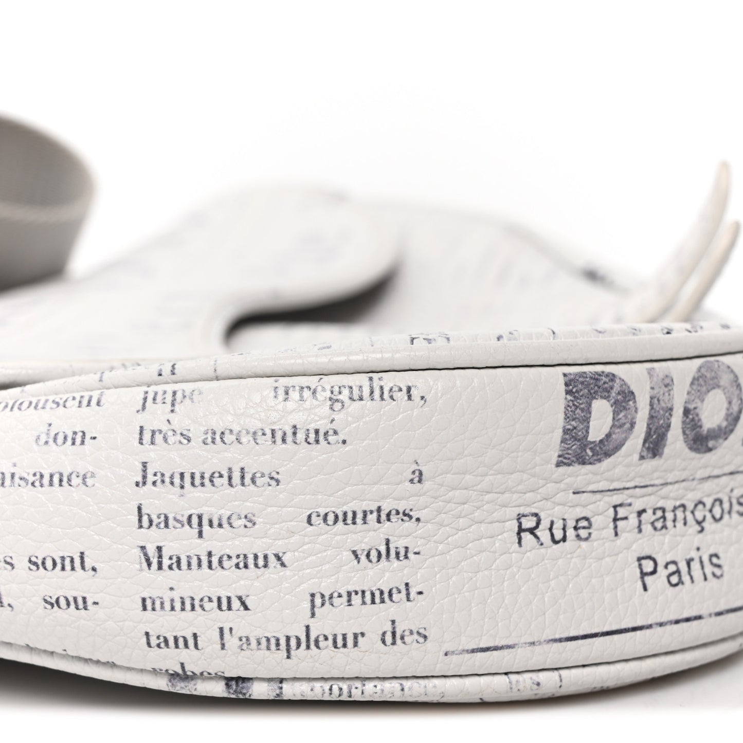 X DANIEL ARSHAM Grained Calfskin Newspaper Print Saddle Bag White