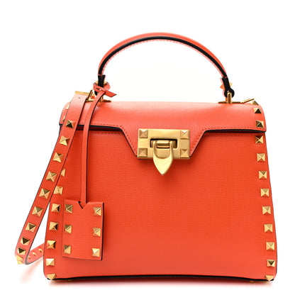 Valentino Garavani Grainy Calfskin Small Rockstud Alcove Top-Handle Flap Bag Orange 1 of 9