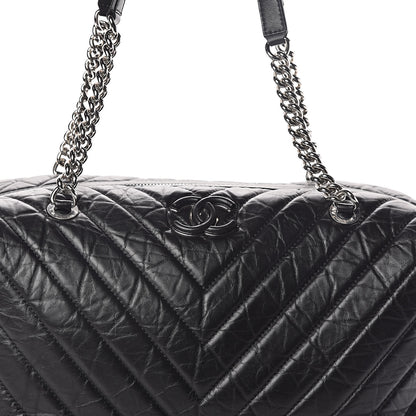 Chanel Aged Calfskin Chevron Quilted Duffle Bag Black 8 of 10
