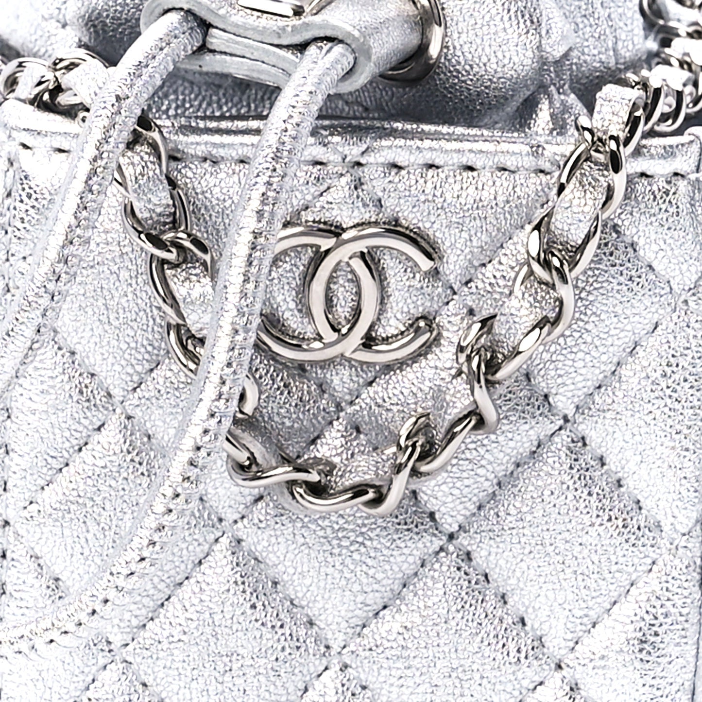 Metallic Caviar Quilted Mini Drawstring Bucket Bag Silver