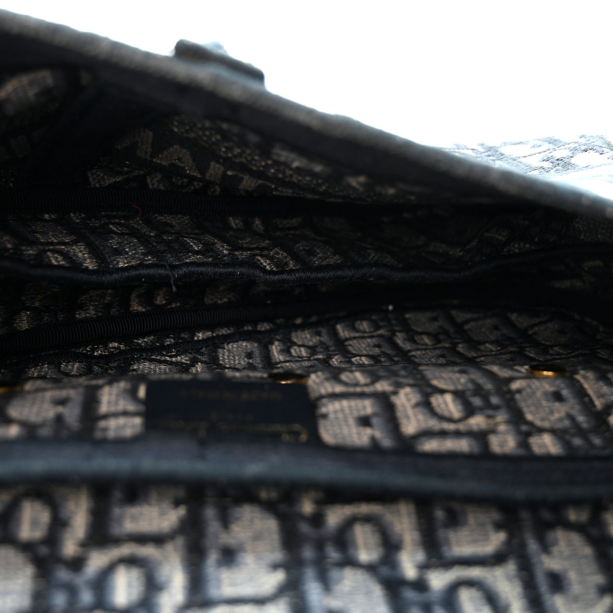 Oblique Embroidered Saddle Bag Blue