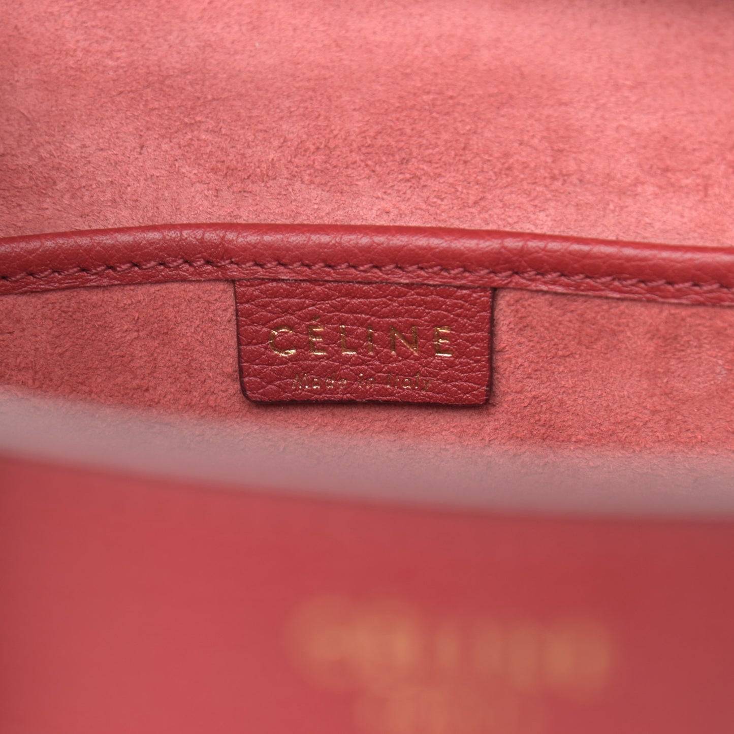 Drummed Calfskin Nano Luggage Ruby