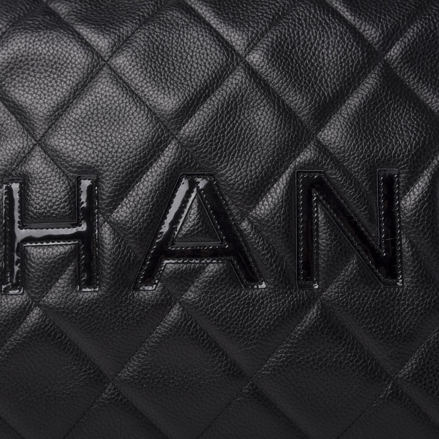 Caviar Patent Quilted Large Bowler Black