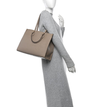 Louis Vuitton Empreinte Monogram Giant Onthego MM Tourterelle 2 of 9