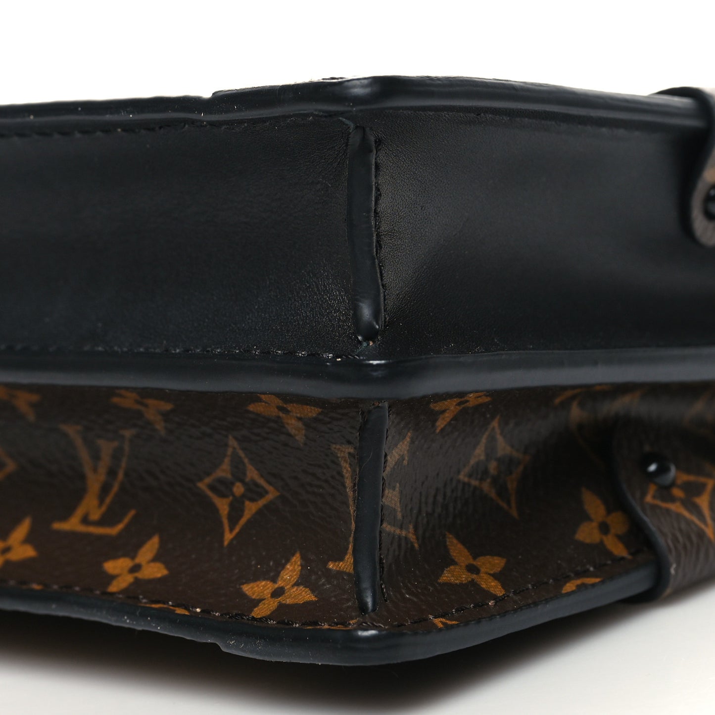 Reverse Monogram Trunk Clutch
