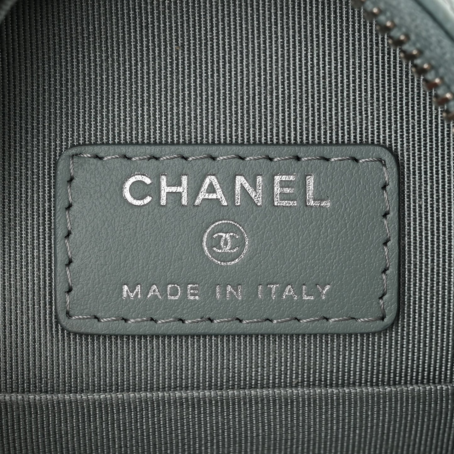 Caviar Quilted Round Clutch With Chain Light Blue