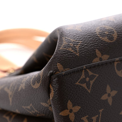Louis Vuitton Monogram Rivoli PM 7 of 16