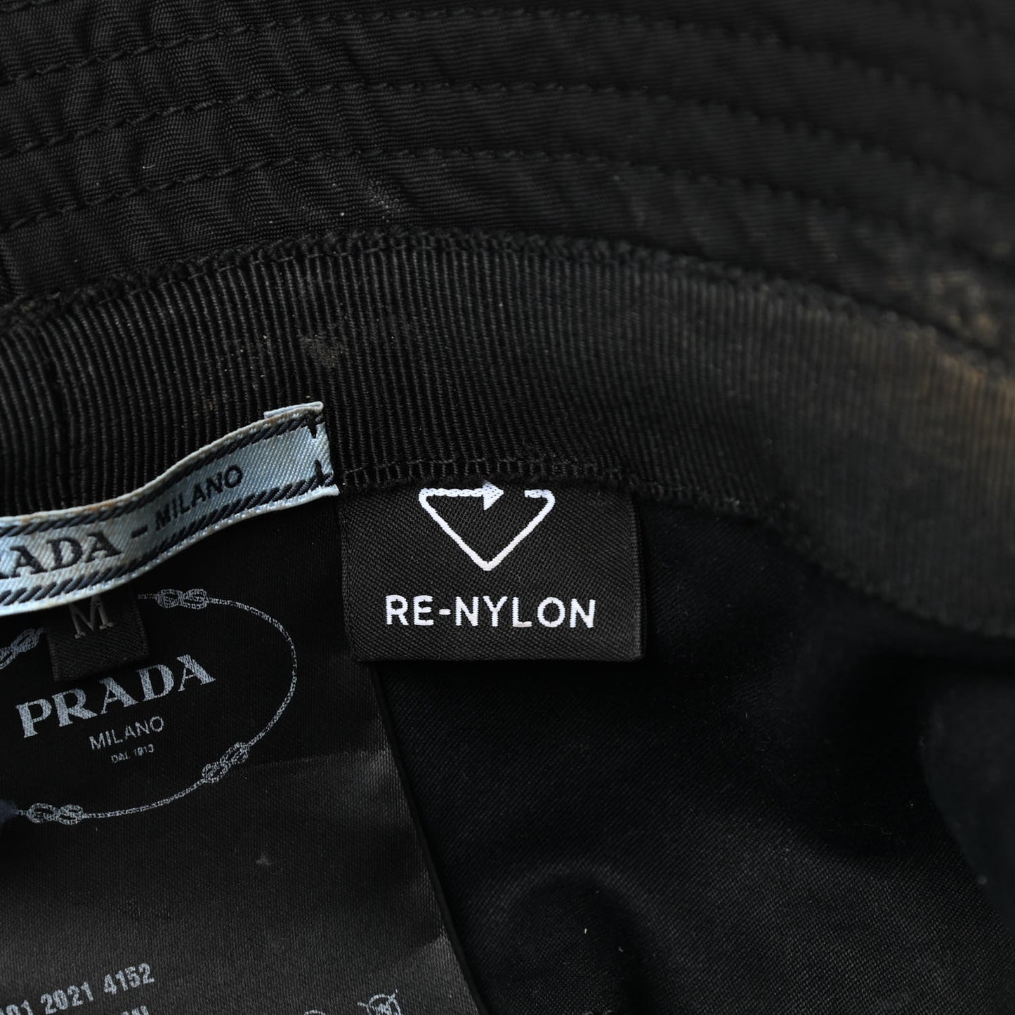 Re-Nylon Metal Triangle Logo Womens Bucket Hat M Black