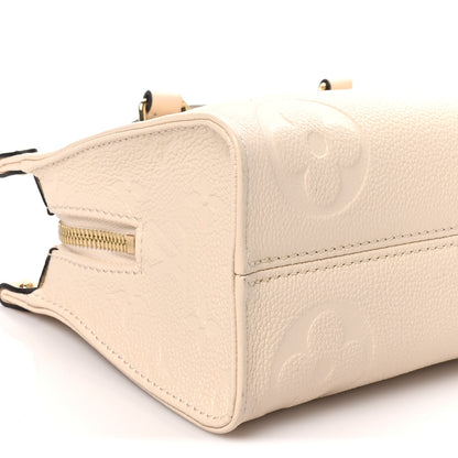 Louis Vuitton Empreinte Monogram Giant OnTheGo East West Creme 8 of 9