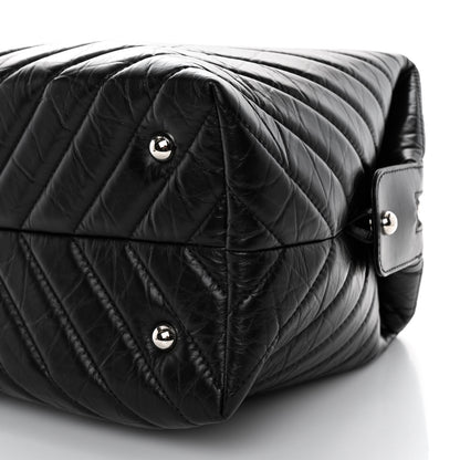 Chanel Aged Calfskin Chevron Quilted Duffle Bag Black 10 of 10