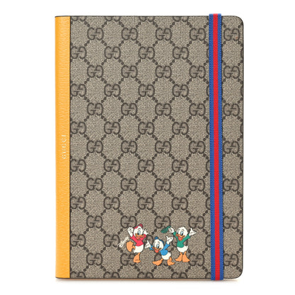 Gucci X DISNEY GG Supreme Monogram Textured Dollar Calfskin Donald Duck Notebook Beige Ebony Yellow 1 of 7