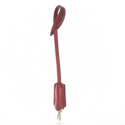 Louis Vuitton Veau Cachemire Soft Lockit Clochette Key Bell Holder and Lock Set Griotte 9 of 9