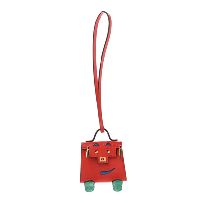 Hermes Tadelakt Chevre Mysore Kelly Quelle Idole Bag Charm Capucine Jaune De Naples Vert Vertigo Zanzibar 1 of 5