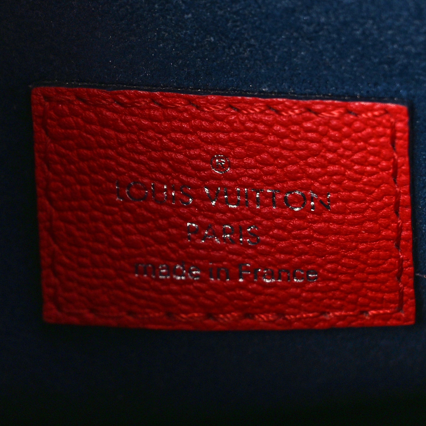 Epi Twist Tote Coquelicot