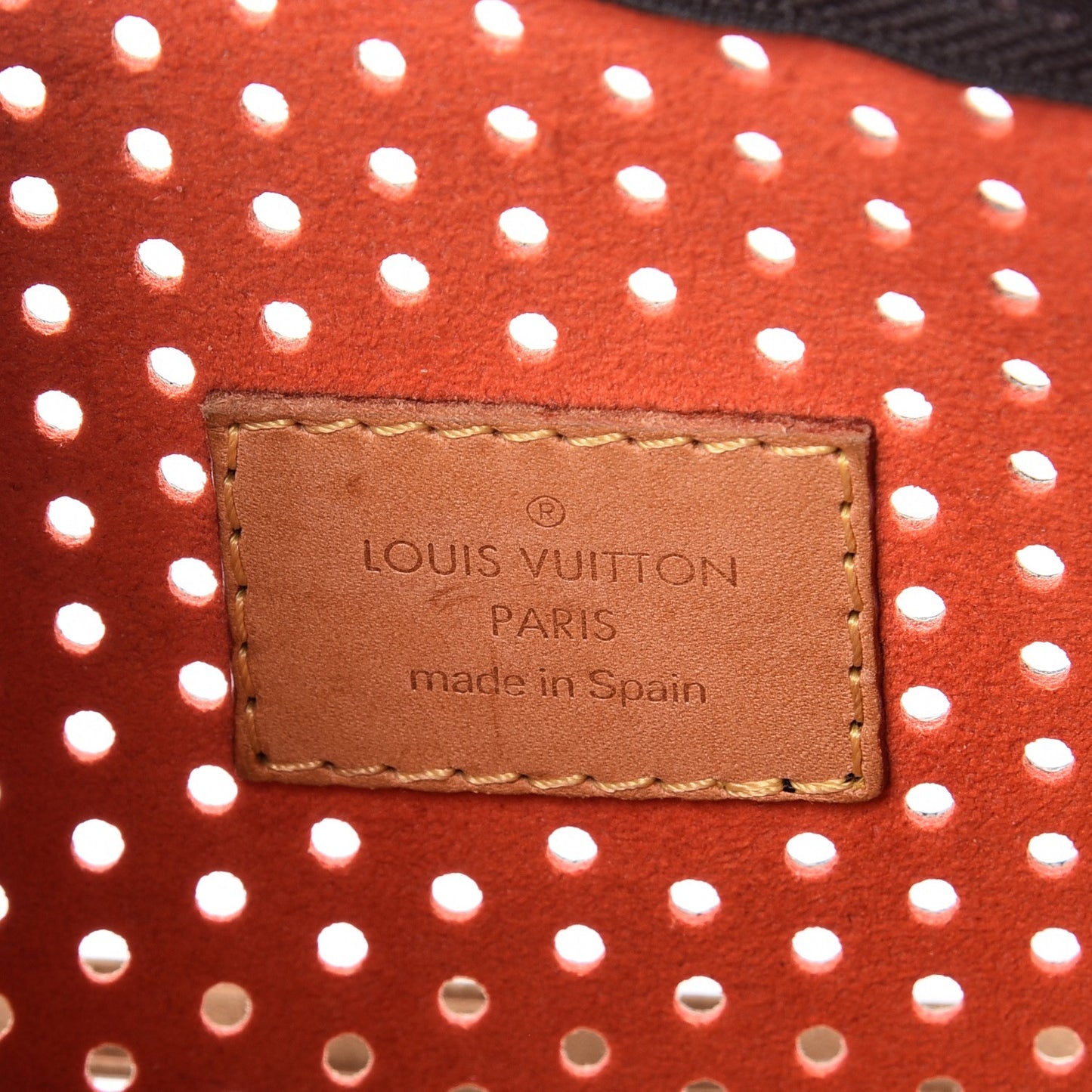 Monogram Perforated Pochette Accessories Bag Orange