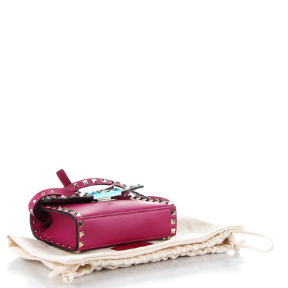 Valentino Garavani Vitello Mini Rockstud Flip Lock Crossbody Bag Deep Cyclamin 4 of 6