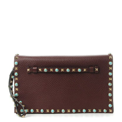 Valentino Garavani Pebbled Calfskin Rockstud Rolling Wristlet Clutch Rubin 1 of 7
