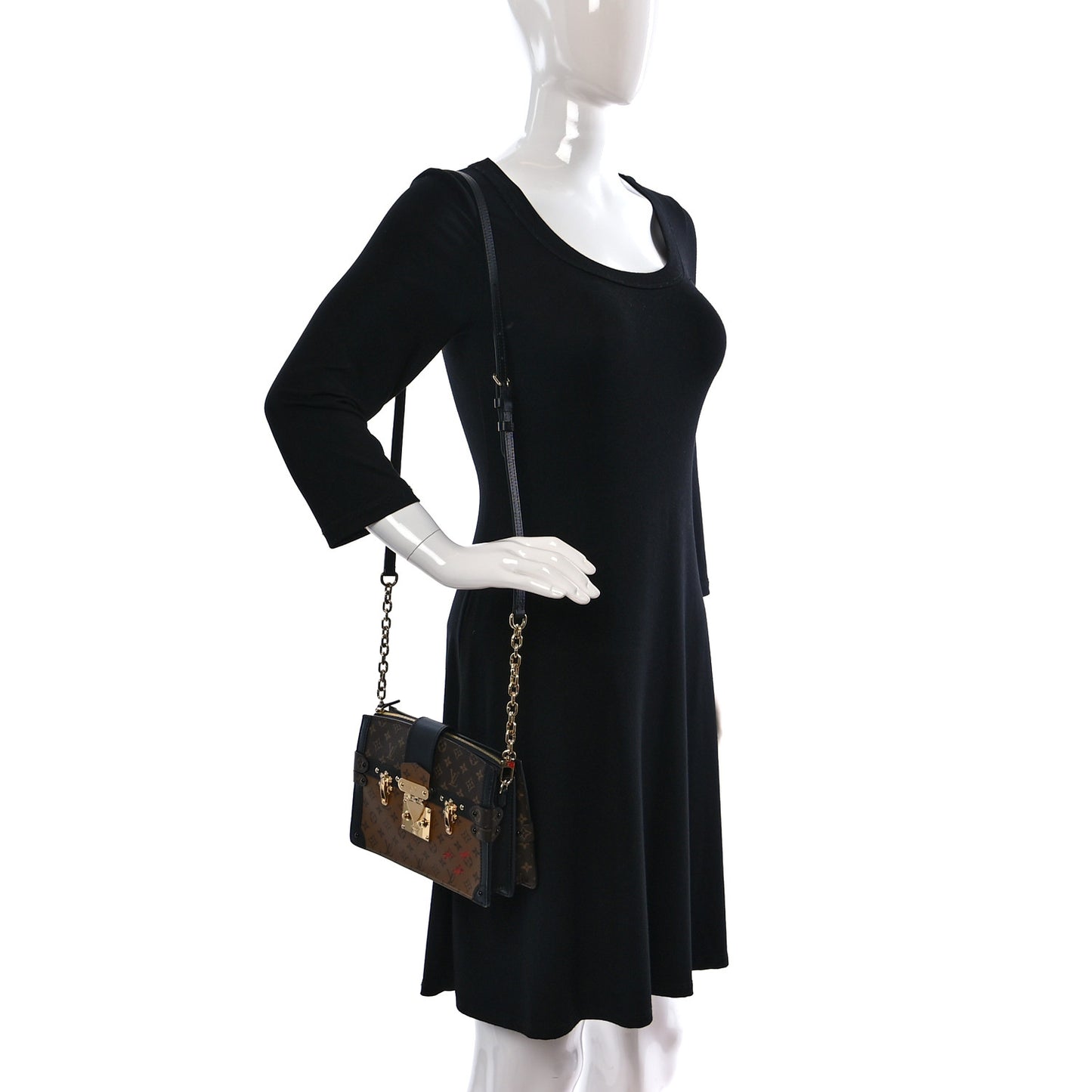 Reverse Monogram Trunk Clutch