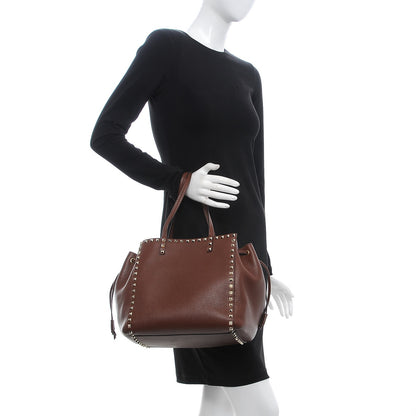 Valentino Garavani Pebbled Calfskin Rockstud Double Handle Cinch Tote Light Brown 3 of 15