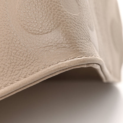 Louis Vuitton Empreinte Monogram Giant Onthego MM Tourterelle 11 of 12