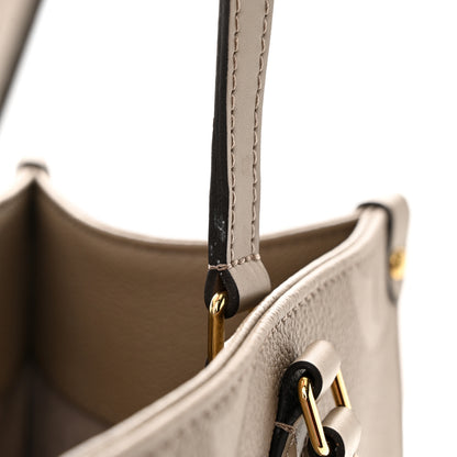 Louis Vuitton Empreinte Monogram Giant Onthego MM Tourterelle 13 of 13