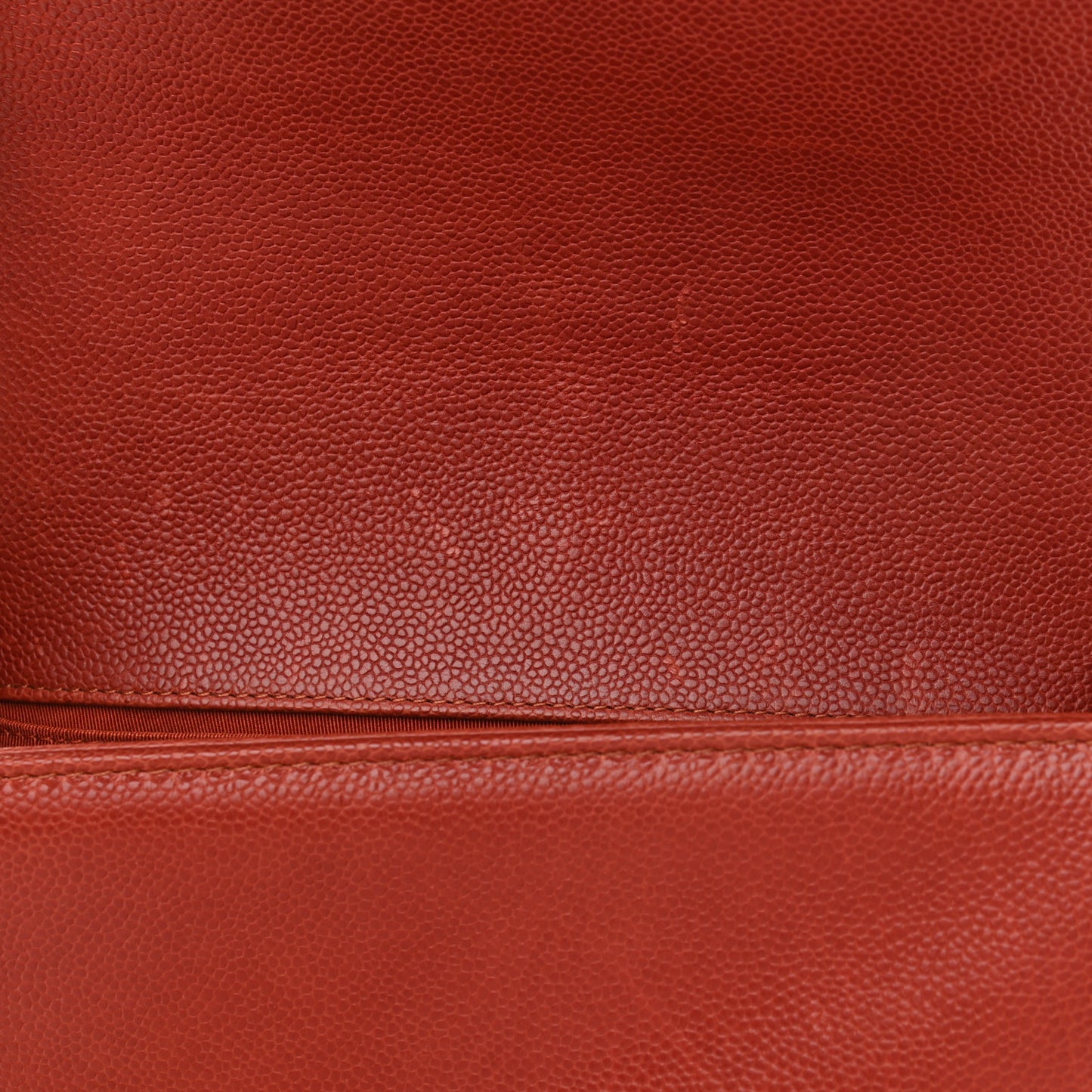 Caviar Quilted Medium Boy Flap Dark Orange