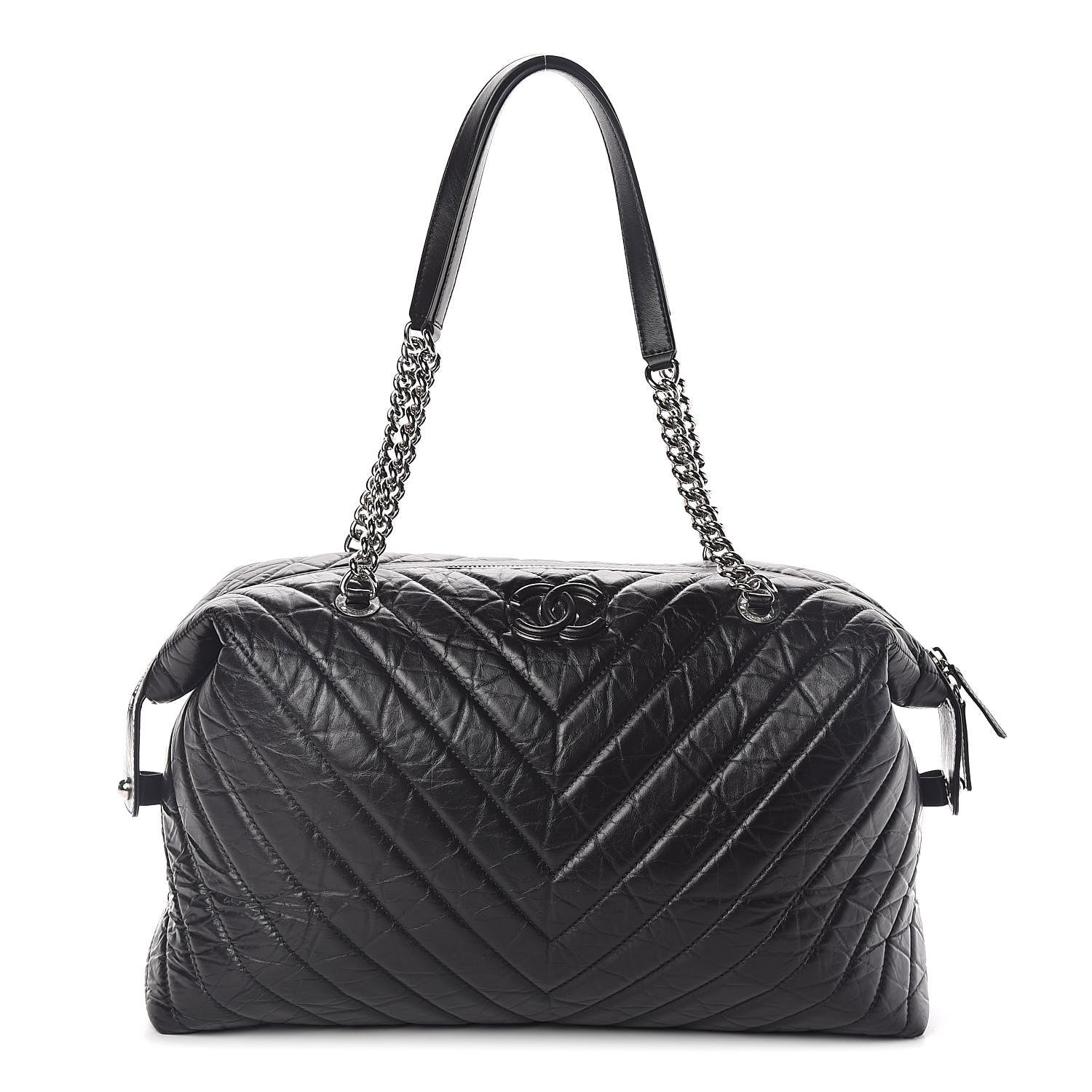 Chanel Aged Calfskin Chevron Quilted Duffle Bag Black 1 of 10