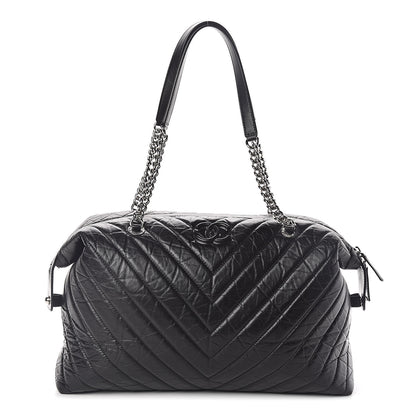 Chanel Aged Calfskin Chevron Quilted Duffle Bag Black 1 of 10