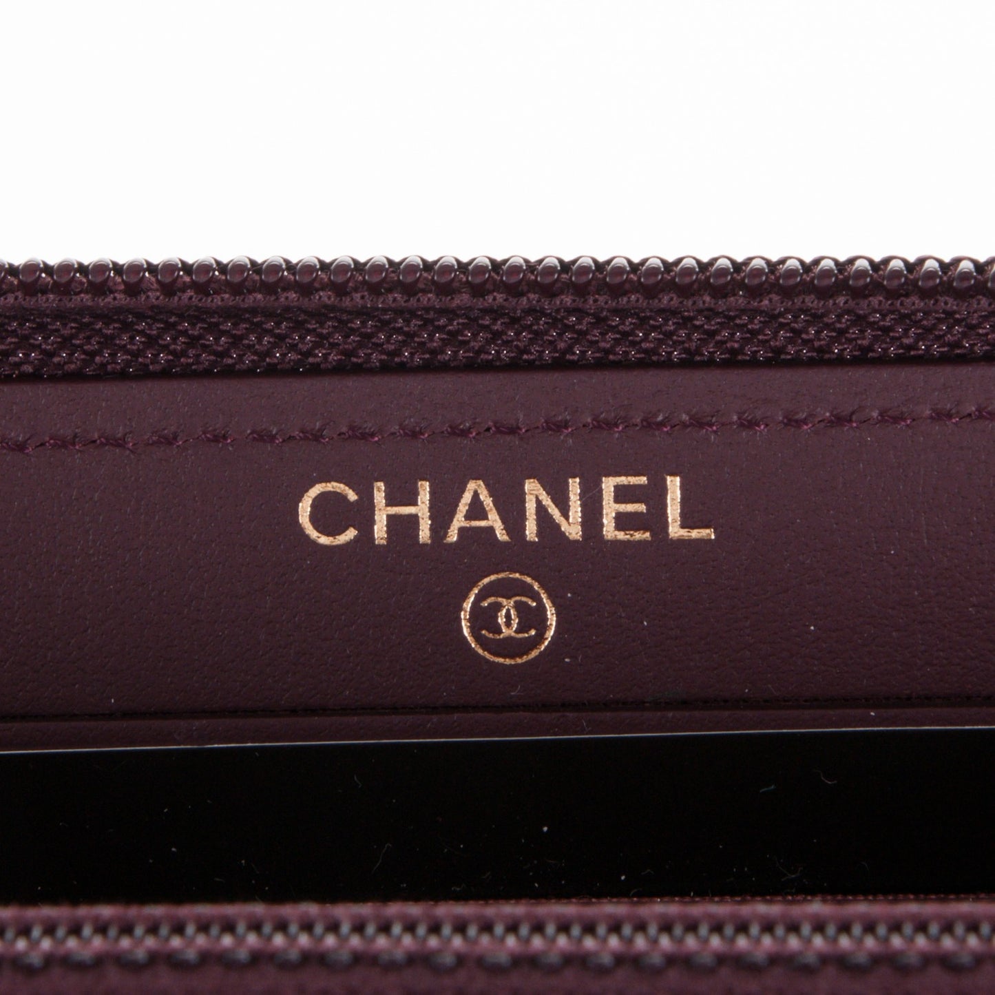 Caviar Quilted Small Boy Zip Around Wallet Dark Purple